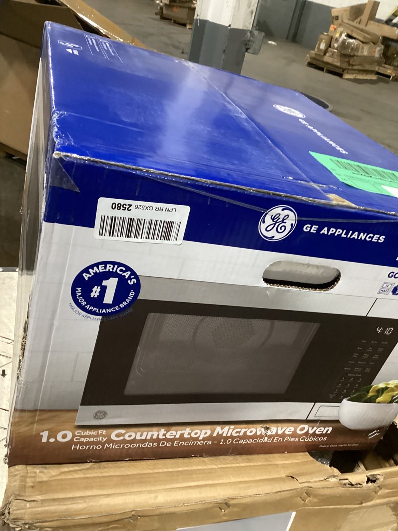 GE GCST10A1WSS 4-in-1 Microwave Oven, 1,050 Watts Air Fryer, Broiler & Convection Mode, Child-Lock T