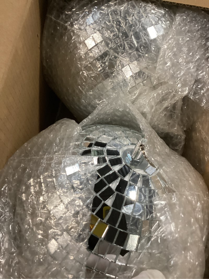 Condition photo showing Good Condition for 2 pack mirror disco ball, 7 inch cool and fun large silver hanging disco ball with hanging ring, reflects light, party favor, christmas new year wedding decor festival stage prop