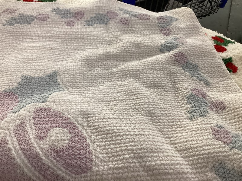 Condition photo showing As Is for Christmas throw rug 
