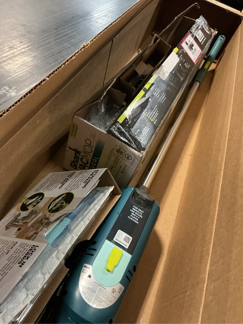 Condition photo showing As Is for shark vacmop reveal new cordless hard floor cleaner, vacuum & spray mop, powerful suction, lightweight, illumination light, includes 4 disposable pads, 12oz pet multi-surface cleaning solution, vm401