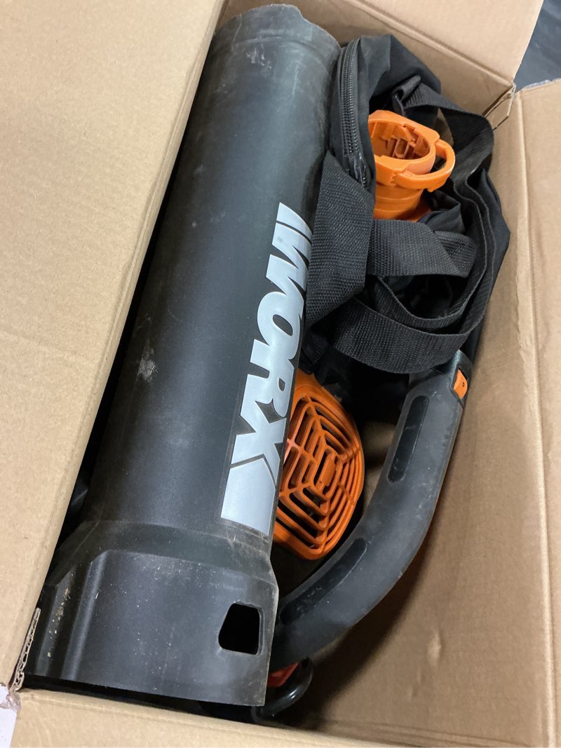Condition photo showing As Is for WORX 12 Amp Trivac 3-in-1 Electric Leaf Blower/Mulcher/Yard Vacuum - WG512