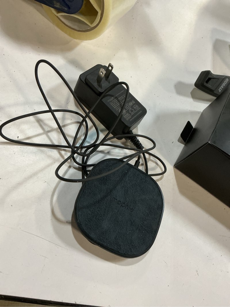 Condition photo showing As Is for mophie wireless 10w charging pad