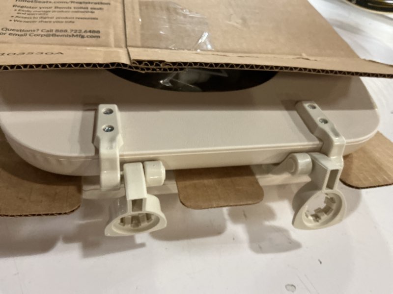 Condition photo showing New/Like New for mayfair padded toilet seat, cushioned soft vinyl over wood core seat, secure hinges, easy clean, made in usa, elongated, bone round bone toilet seat