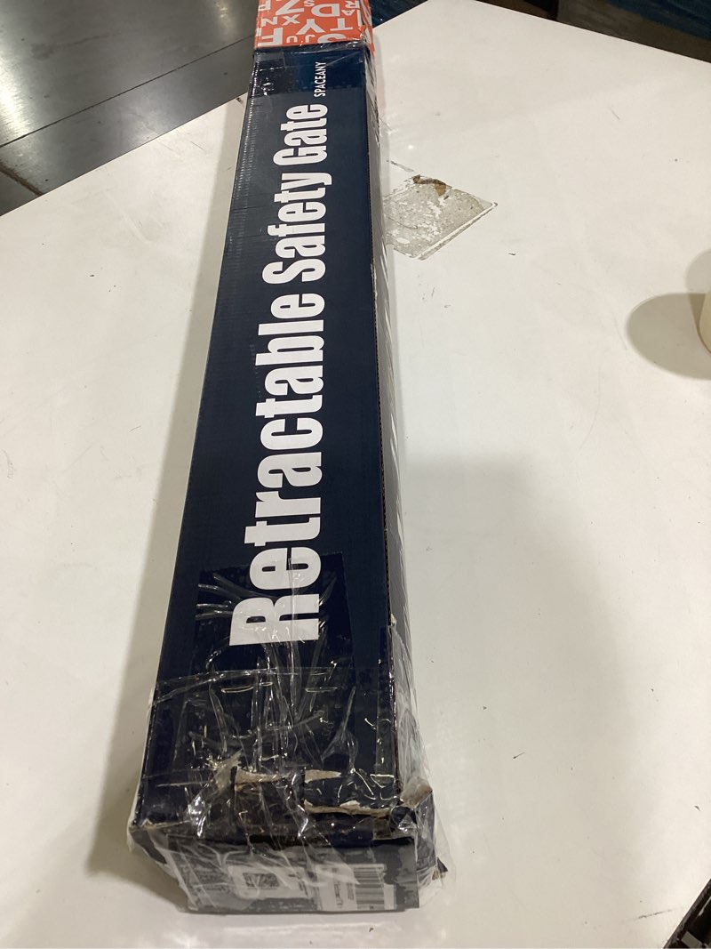 Condition photo showing As Is for retractable safety gate