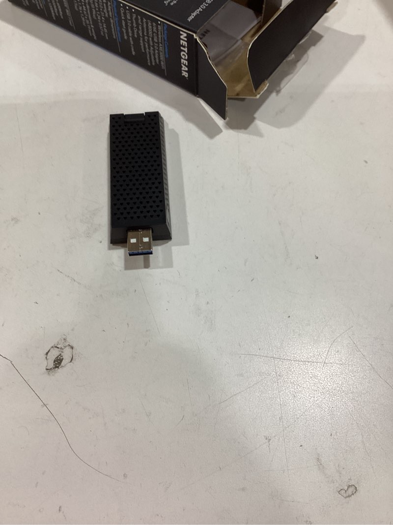 Condition photo showing As Is for netgear nighthawk wifi 6e usb 3.0 adapter (a8000) - axe3000 tri-band wireless gigabit speed (up to 3gbps) - new 6ghz band – works with any wifi 6 or 6e router or mesh system - for windows pc wifi 6, 3.0gbps