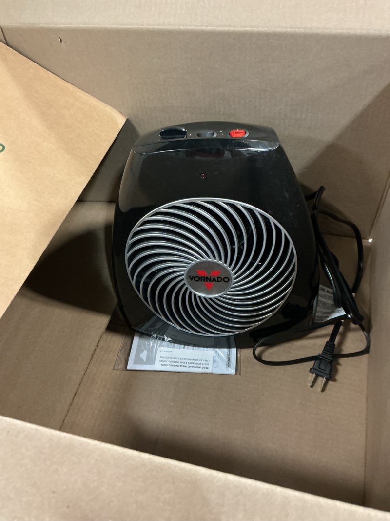 Condition photo showing As Is for vornado mvh (2025) space heater, 3 heat settings, adjustable thermostat, tip-over protection, auto safety shut-off system, indoor use, whole room heating, black
