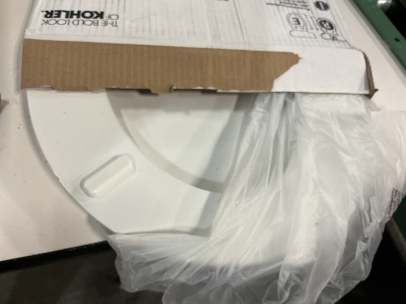 Condition photo showing As Is for kohler stonewood quiet-close, round toilet seat soft close, durable wood, easy installation, universal fit, home essentials, white finish, k-20467-0 white round double-hinge