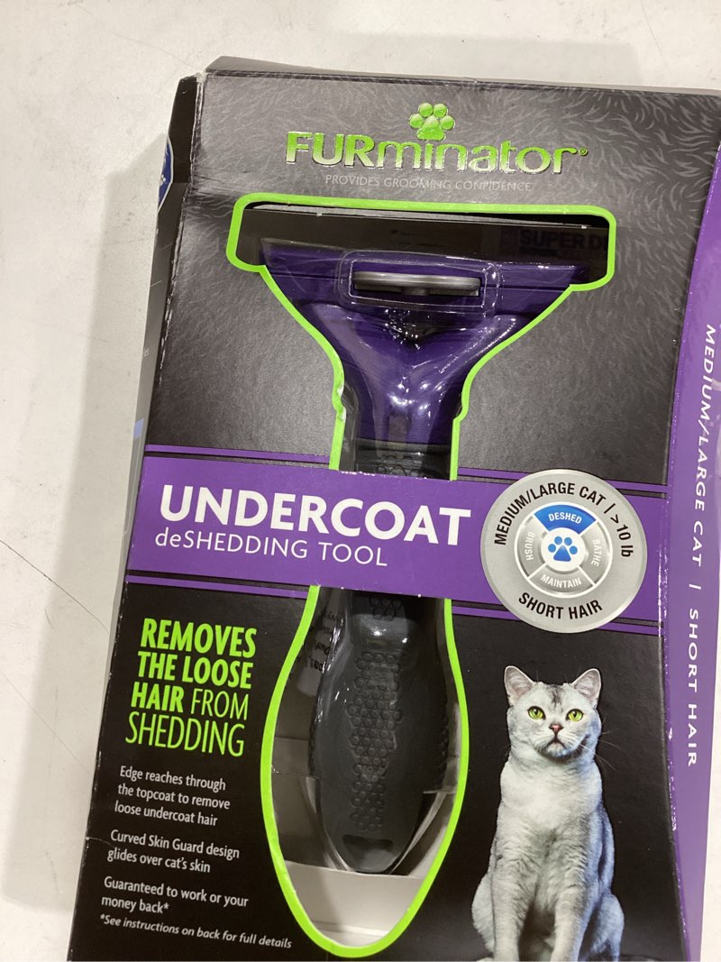 Condition photo showing New/Like New for furminator deshedding tool for medium to large cats with short hair, removes loose hair from shedding large short hair