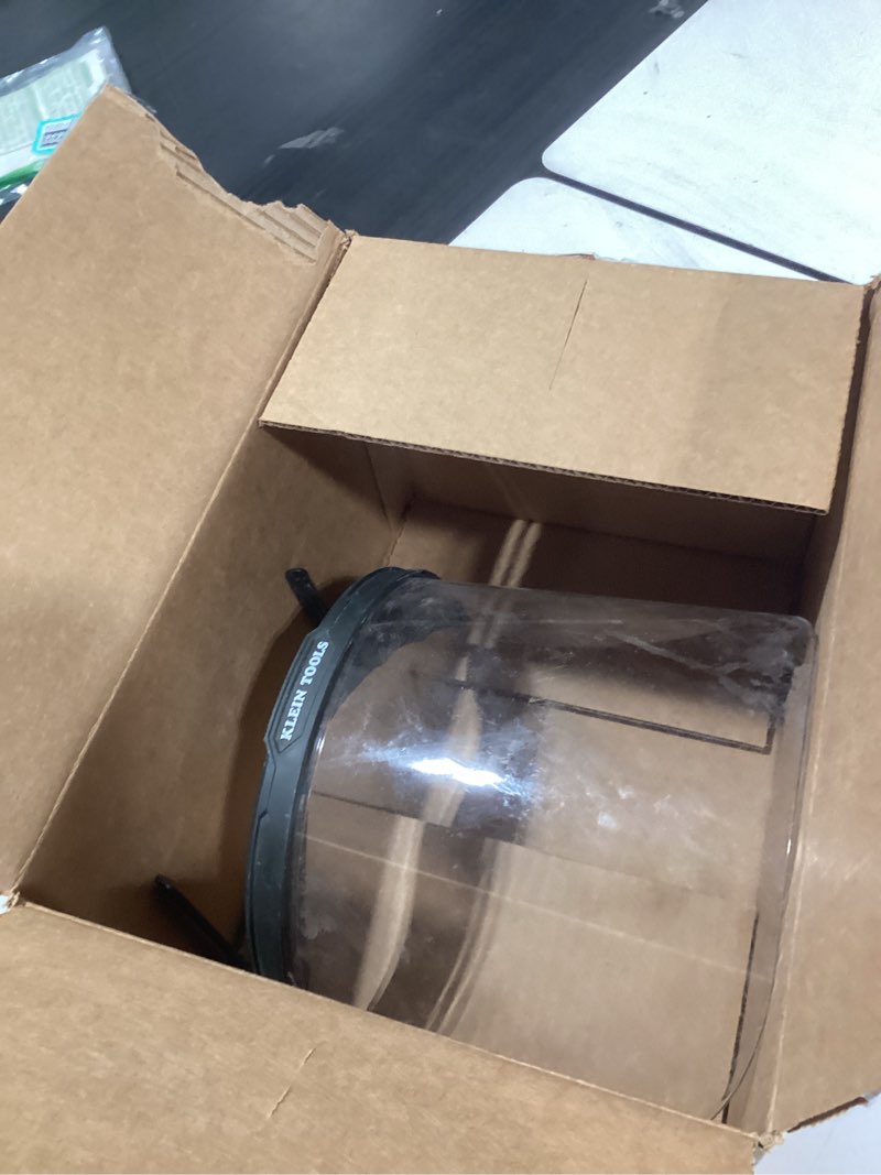 Condition photo showing As Is for klein tools 60472 clear face shield for safety helmet and cap-style hard hats, impact rated, anti-fog, low-profile design for grinding