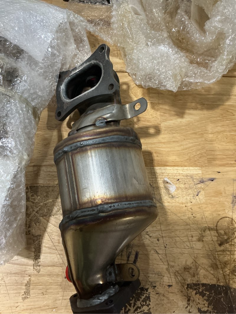Condition photo showing As Is for philtop front left catalytic converter for pilot, odyssey, mdx, accord, rdx, ridgeline, tl, passport, tlx, crosstour, accord crosstour, rlx, rl, tsx, zdx, 674145 (epa compliant)