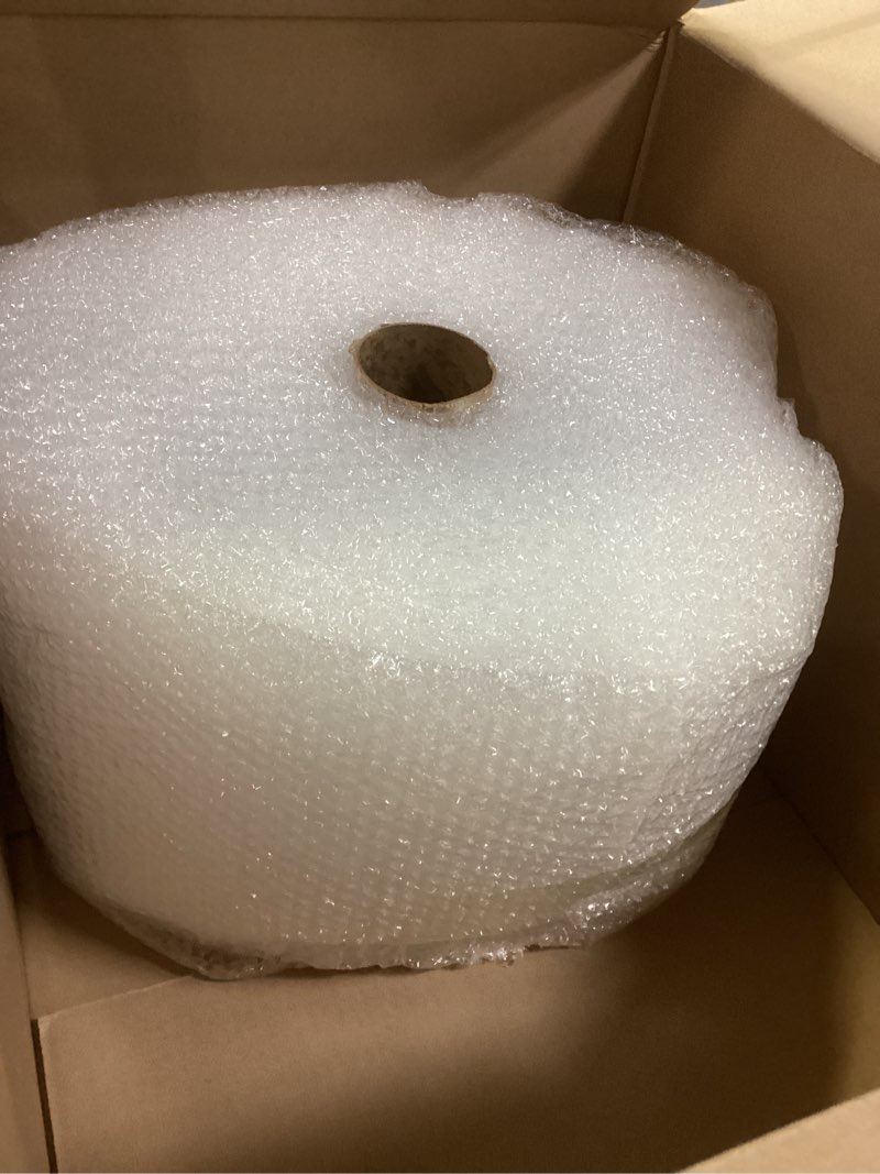 Condition photo showing New/Like New for amazon basics bubble wrap for moving, packing, shipping and storage, perforated protective cushioning for fragile items, 12-inch x 175-ft long roll, small 3/16", clear