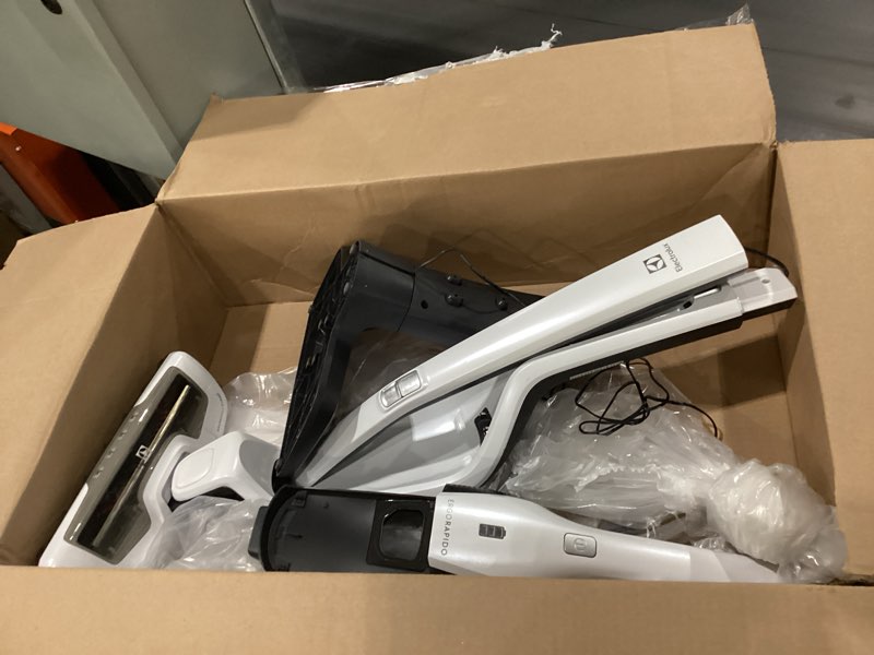 Condition photo showing As Is for USED NOT TESTED MISSING CANISTER Electrolux Ergorapido Cordless 2-in-1 Vacuum Cleaner with High Suction Power and 180° EasySteer Mobility, 48-Minute Run Time, 2 Power Modes, Satin White