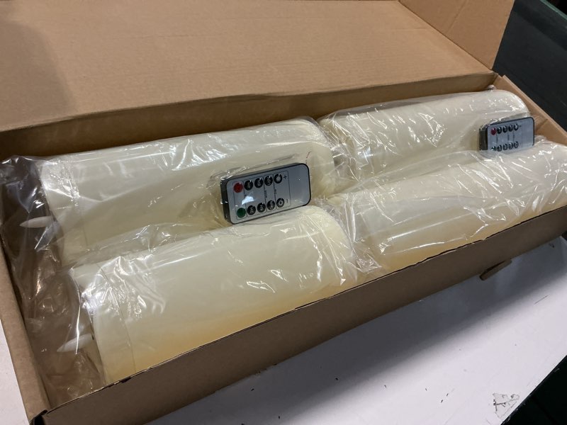 Condition photo showing Good Condition for 8" 10" 12" 14" x 4" Large Waterproof Outdoor Flameless Candles, 4 Pcs LED Pillar Candles with Remote and Timers Battery Operated Jumbo Flickering for Home Patio Porch Church Indoor Lanterns Ivory White 8" 10" 12" 14" X 4" Classic