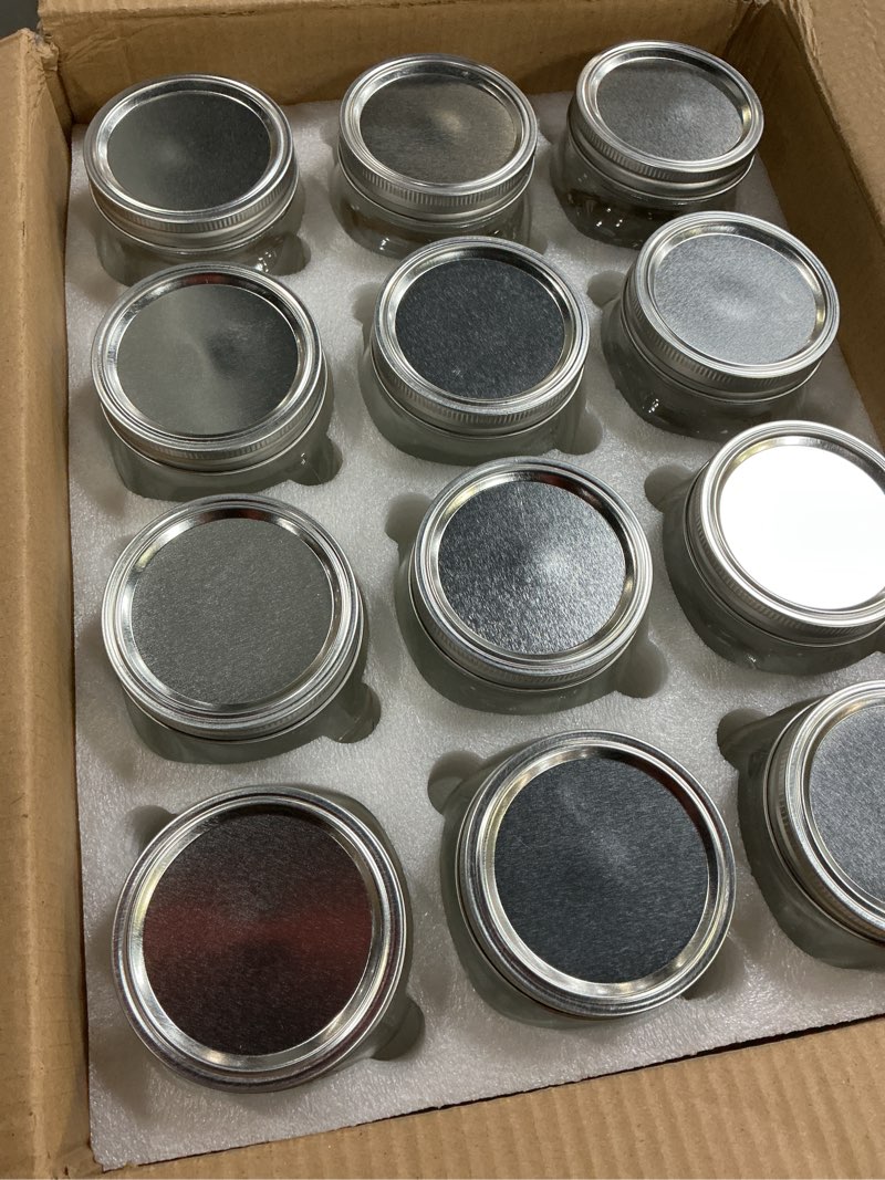 Condition photo showing item condition for WELLIFE Wide Mouth Mason Jars, 12 Pack Mason Jars 32 oz for Pickling, Canning, Fermenting and Food Storage, Microwave & Dishwasher Safe Clear Mason Jars 32oz-12Pcs