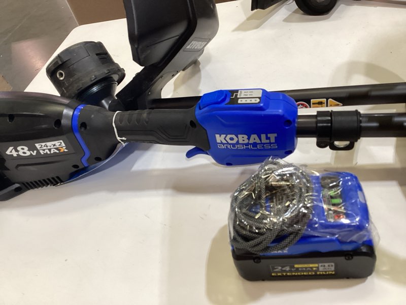 Condition photo showing As Is for kobalt 48v max string trimmer 