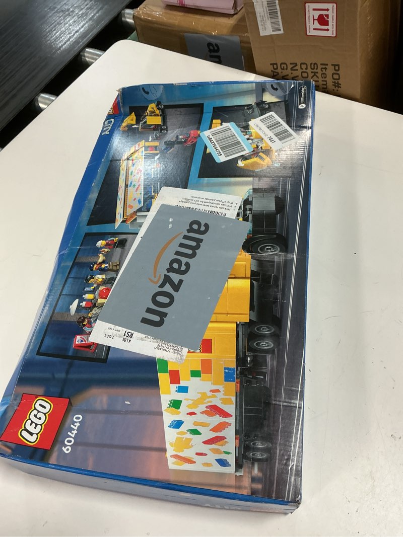 Condition photo showing New/Like New for LEGO City Yellow Delivery Truck Toy, Comes with a Semitruck Model, Forklift and 4 Minifigures for Pretend Play, Fun Birthday Gift Idea for Kids' 8 Years Old and Up, 60440