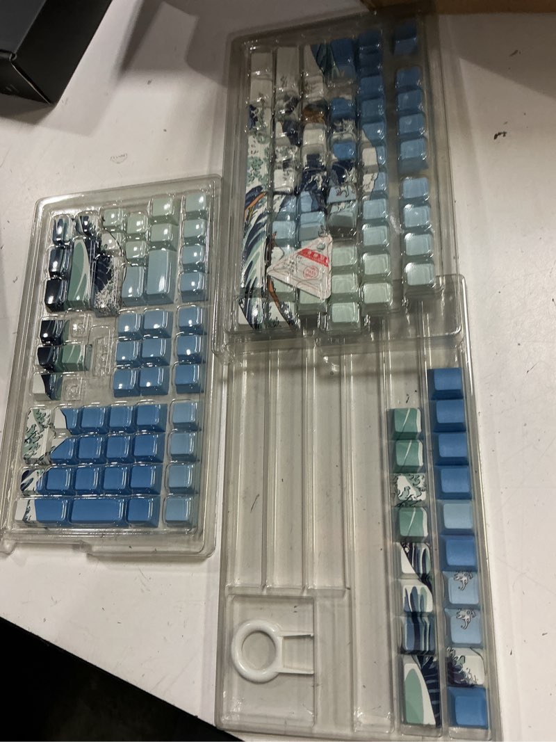 Condition photo showing As Is for xvx shine through keycaps, side print pbt keycaps 75 percent dye sub, 131 keys cherry profile custom keycap 60 percent, wave of kanagawa double shot keyboard keycap for mechanical keyboards blue kanagawa theme