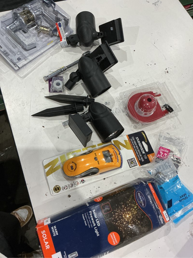 Condition photo showing As Is for assorted home improvement lot (small tools, screw, home accessories, etc.)