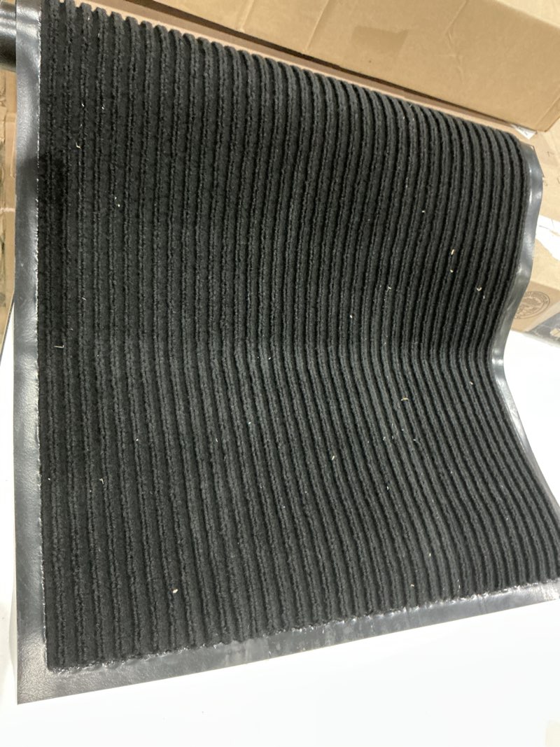 Condition photo showing As Is for fani low profile rubber entrance doormats, 72x48 inch, jet black | heavy duty, indoor and outdoor, waterproof, anti-skid rubber back, welcome mats for entryway, patio, porch