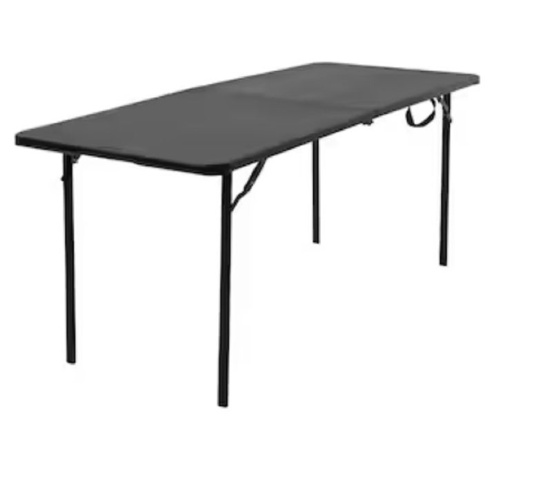 Condition photo showing Good Condition for Cosco 2.5-ft x 6-ft Fold-in-Half Indoor or outdoor Rectangle Resin Black Folding banquet table 8 -Person