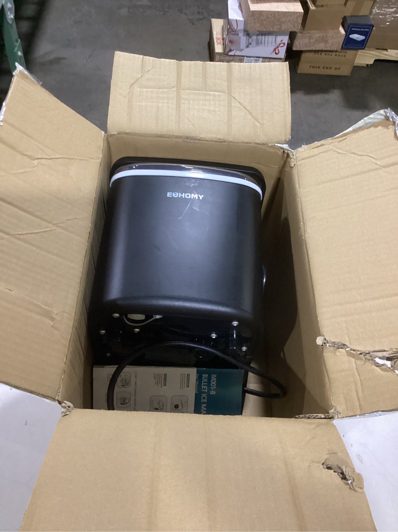 Condition photo showing As Is for EUHOMY Countertop Ice Maker Machine with Handle, 26lbs in 24Hrs, 9 Ice Cubes Ready in 6 Mins, Auto-Cleaning Portable Ice Maker with Basket and Scoop, for Home/Kitchen/Camping/RV. (Black) ICE MACHINE 11.57"D x 11.42"W x 8.74"H Black