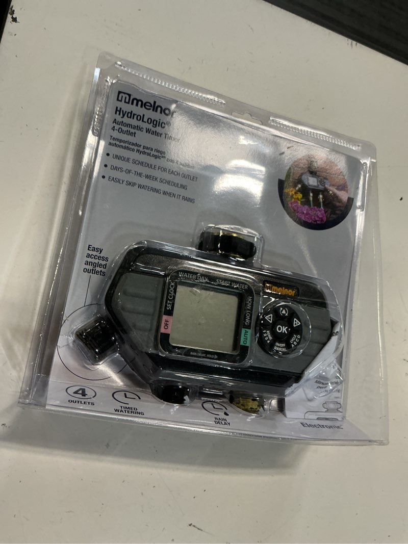 Condition photo showing As Is for melnor hydrologic programmable 4 zone digital water timer