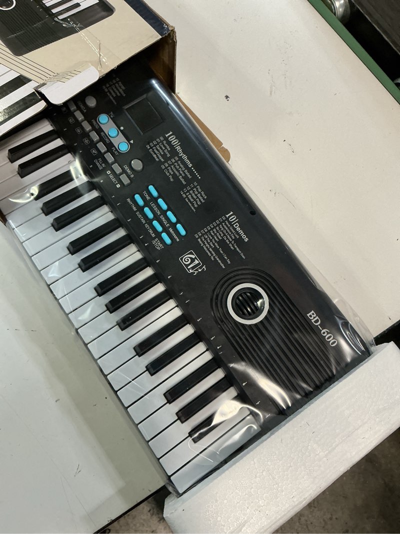 Condition photo showing New/Like New for 61 keys keyboard piano, electronic digital piano with built-in speaker microphone, portable keyboard gift teaching for beginners, electric piano for kids, birthday gift for children black