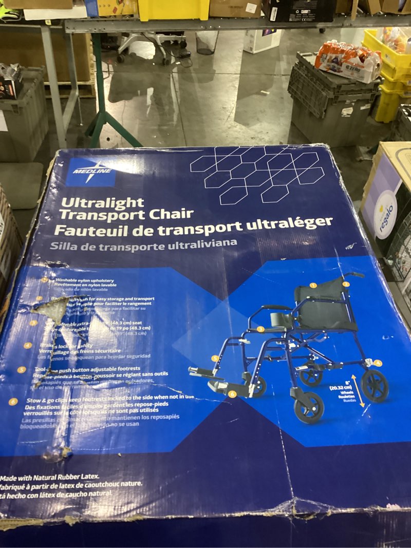 Condition photo showing item condition for Medline Ultra Lightweight Transport Wheelchair for Adults  Foldable  19-Inch Seat Width  Blue Frame  Black Upholstery