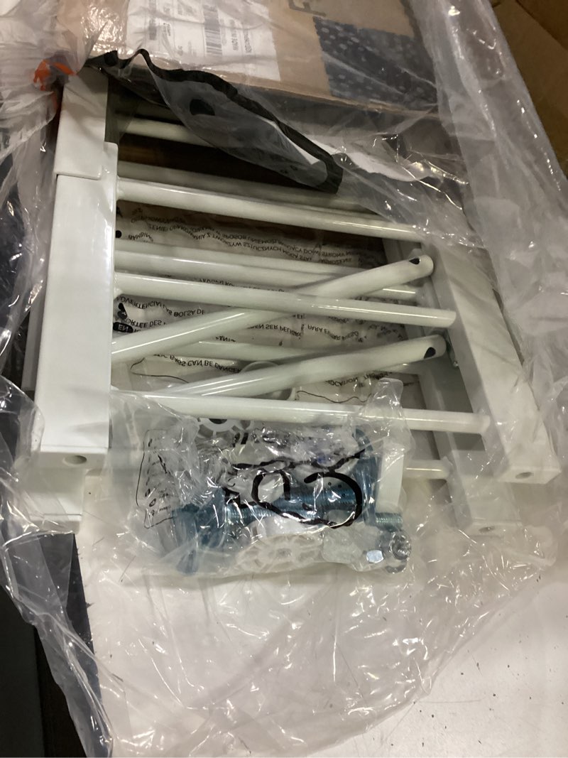 Condition photo showing Good Condition for fldofaves dog gate - 18"-45" adjustable extra wide metal baby gate to step over, 10" tall small pet gate with 3 extension kits, pressure mounted for doorways & stairs 18-45''w*10''h white