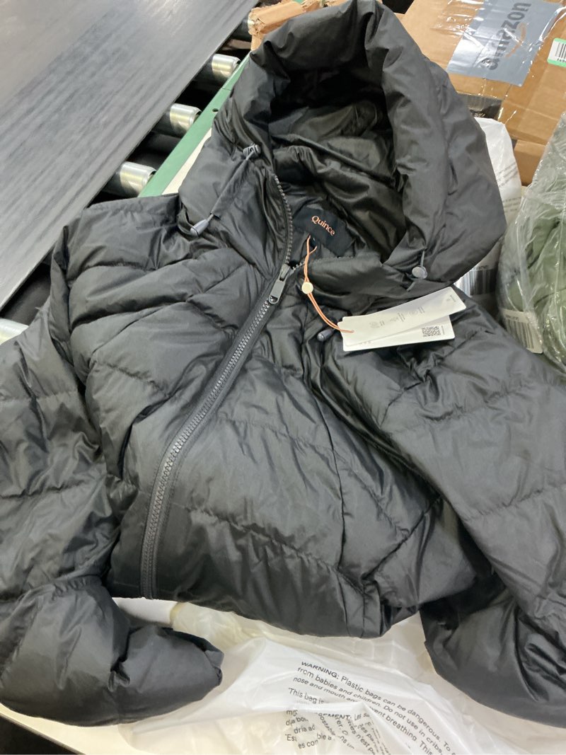 Condition photo showing New/Like New for lightweight down packable puffer hooded jacket, l, black