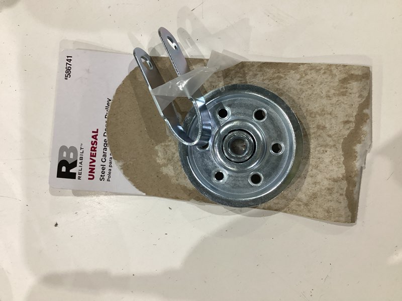Condition photo showing As Is for reliabilt zinc plated steel garage door pulley