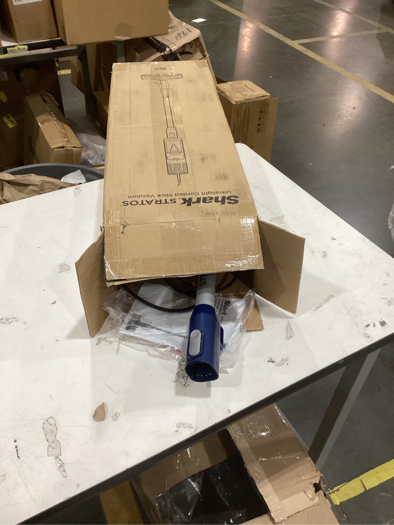 Condition photo showing As Is for shark hz3002 stratos ultralight corded stick vacuum with duoclean powerfins hairpro, self-cleaning brushroll, & odor neutralizer technology, navy stratos w/ duoclean & odor tech