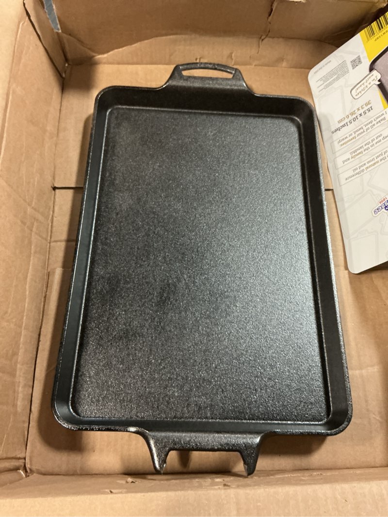 Condition photo showing As Is for lodge cast iron baking pan