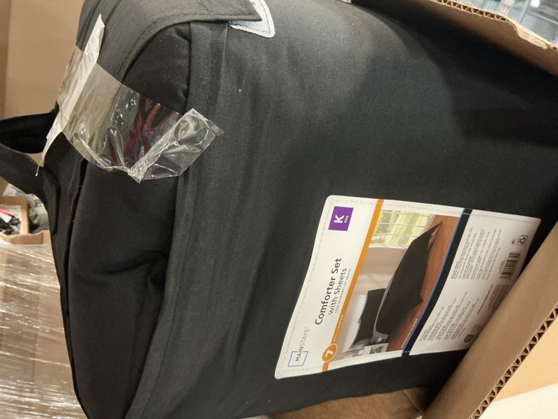 Condition photo showing As Is for mainstays all in one reversible comforter and sheet set- 5 piece, twin, black