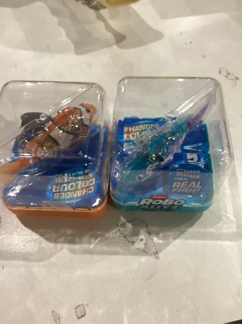 Condition photo showing Good Condition for robo alive robo fish robotic swimming fish (teal + orange) by zuru water activated, changes color, comes with batteries, amazon exclusive (2 pack) series 3 teal + orange 2 piece set series 3