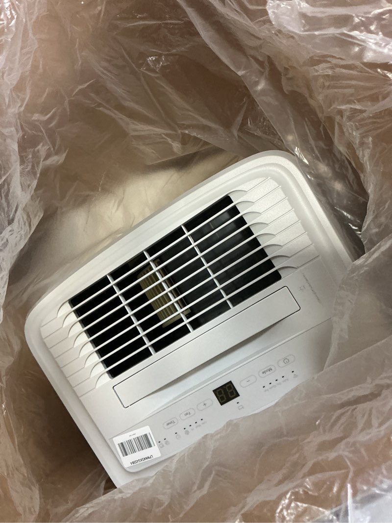 Condition photo showing As Is for Frigidaire 50-Pint Portable Dehumidifier with Wi-Fi and Energy Star Certification for Medium/Large Rooms & Basements, Custom Humidity Control, Auto Shut Off, White