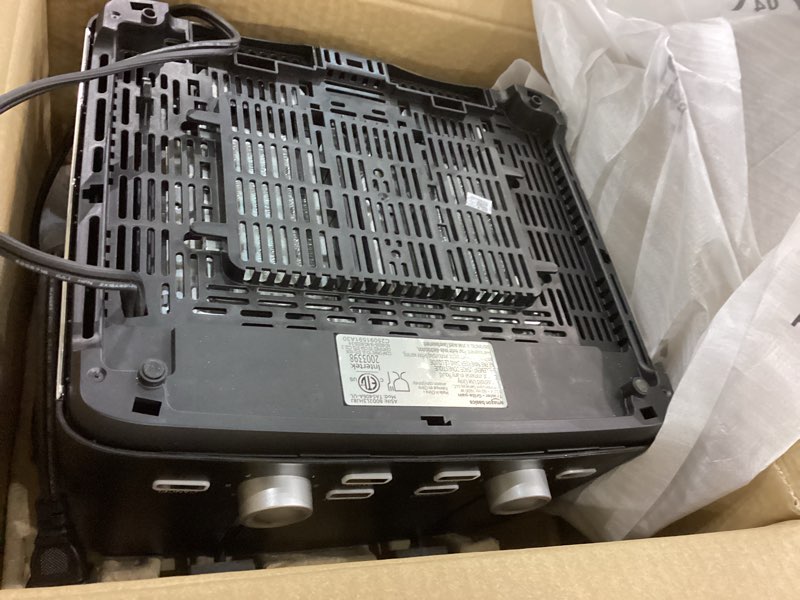 Condition photo showing New/Like New for Amazon Basics 4 Slice Toaster, With 7 Browning Settings, Extra Wide Slots For Bagels and Special Breads, Removable Easy-to-Clean Crumb Trays, Cancel/Defrost/Bagel Buttons, 1500W, Black & Silver