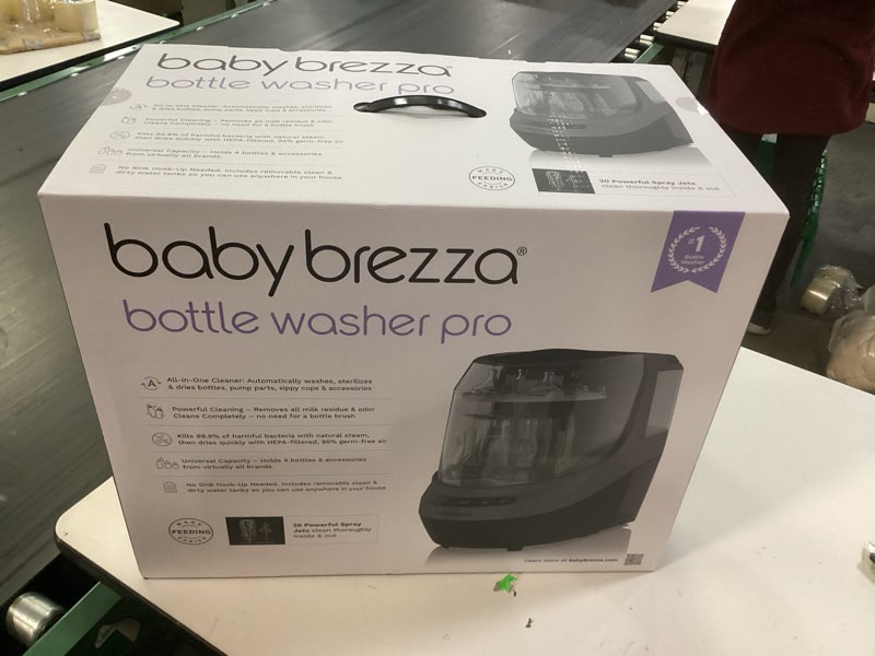 Condition photo showing New/Like New for baby brezza bottle washer pro - baby bottle washer, sterilizer + dryer - all in one machine cleans baby essentials, bottles + pump parts – appliance replaces bottle brushes & drying racks, charcoal