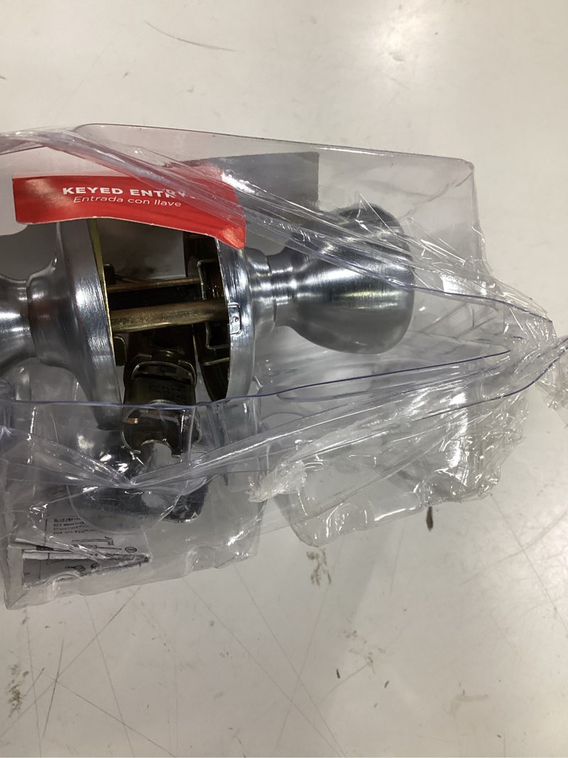 Condition photo showing As Is for kwikset tylo satin chrome entry door knob 1-3/4 in.