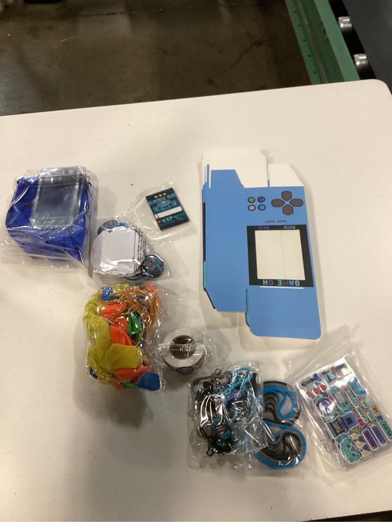 Condition photo showing New/Like New for 147 pcs video game party favors for 12 kids gamer goodie bag stuffers for boys gaming birthday party supplies with gift boxes, vip pass, balloons, bracelets, keychains, badges, 3d stickers blue 147