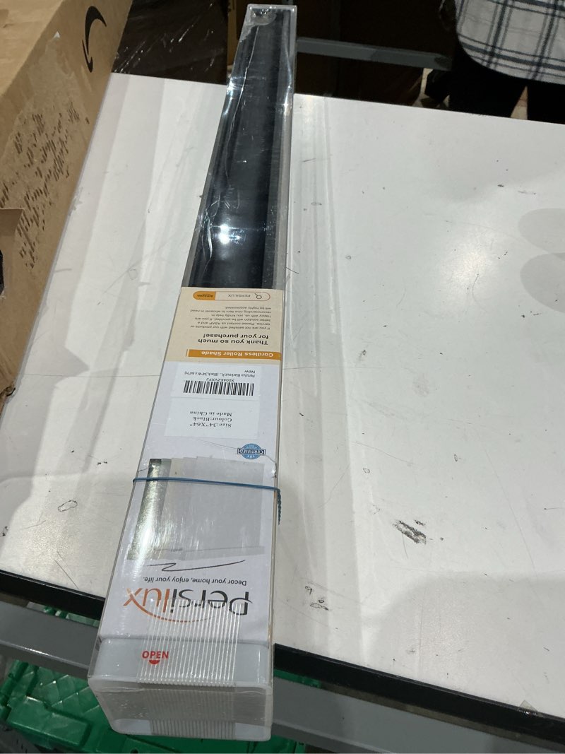 Condition photo showing Good Condition for persilux blackout roller blinds for indoor windows, cordless roller shades with valance, thermal insulated fabric window shades & blinds, uv protection shades for home and bedroom (black,34"w x 64"h) 34"w x 64"h black