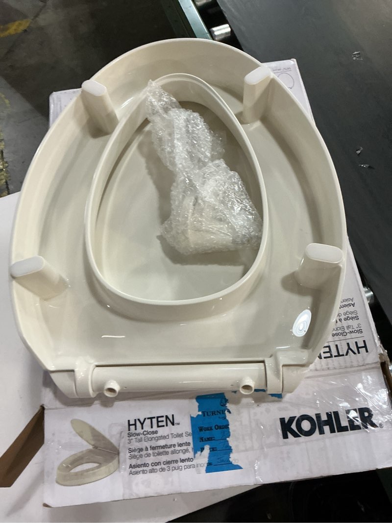 Condition photo showing Good Condition for KOHLER 25875-96 Hyten 3" Height, Elevated Soft Close Elongated Toilet Seat, Contoured Seat with Grip-Tight Bumpers, Quick-Attach Hardware, No Slam Toilet Seat, Biscuit Biscuit Elongated