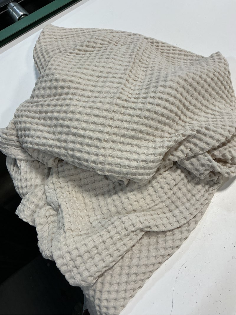 Condition photo showing Good Condition for 50”x60” awesome home waffle large grid pattern khaki bamboo viscose blanket