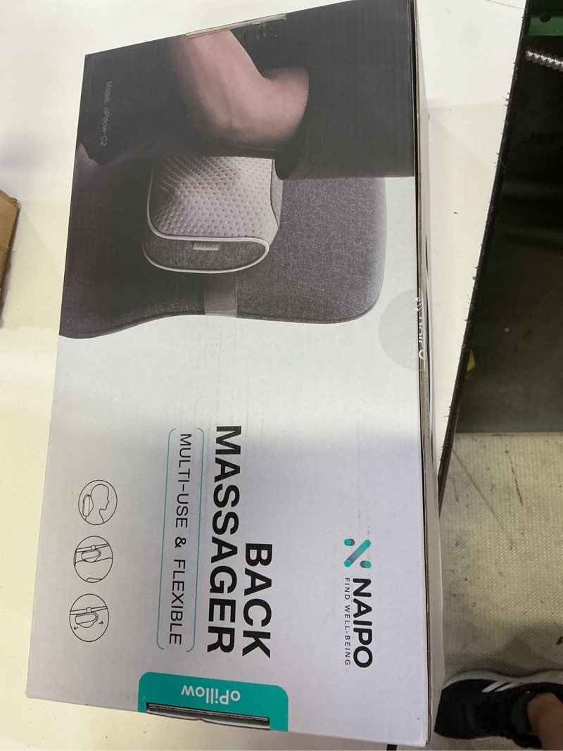 Condition photo showing New/Like New for naipo back massager pillow soothing heat function easy one-button control