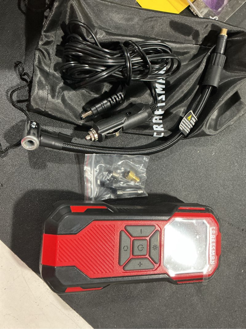 Condition photo showing As Is for (incomplete) craftsman tire inflator portable air compressor, cordless mini air pump for car tires with digital tire pressure gauge, 6000mah battery powered air pump, max pressure 150 psi, 12v dc corded
