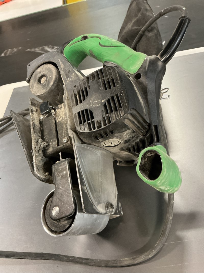 Condition photo showing As Is for metabo hpt 9 -amp variable speed belt sander with dust management