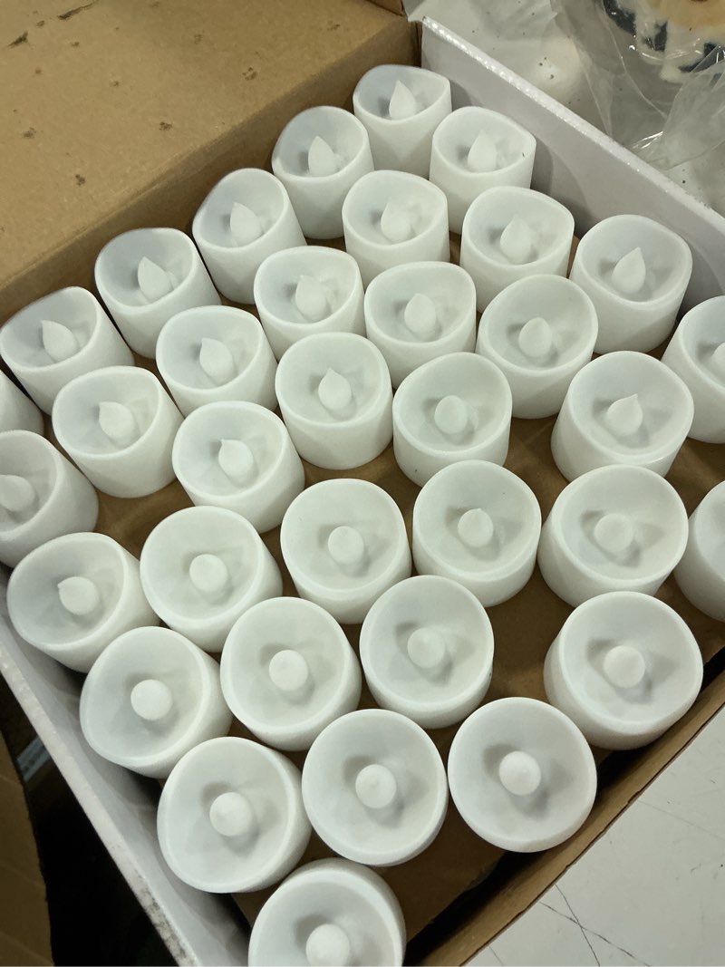 Condition photo showing New/Like New for homemory 72-pack novelty flickering flameless tea lights, 200+hours battery operated, fake electric led votive candles for small wedding table centerpieces, proposals, anniversaries warm white glow, white base pack of 72