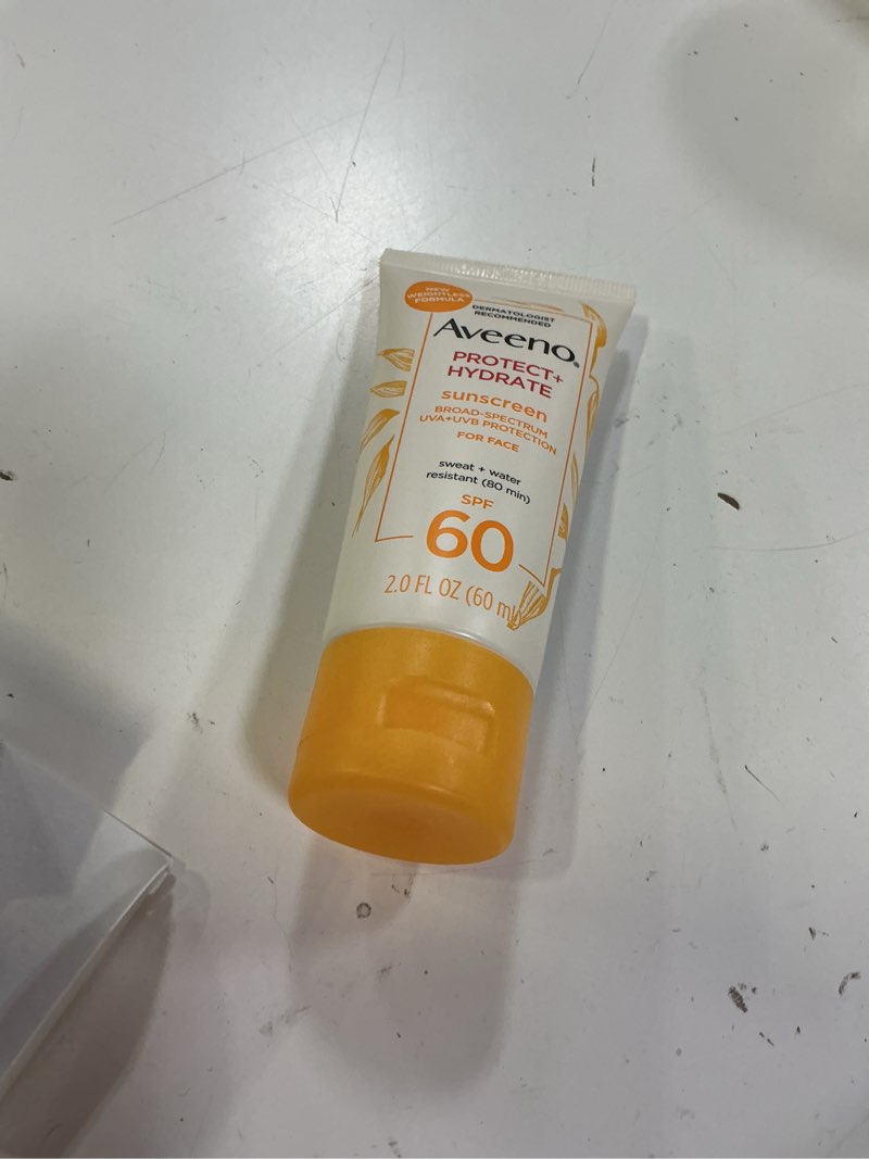 Condition photo showing Good Condition for aveeno protect + hydrate face sunscreen, spf 60 broad spectrum, for sensitive skin, travel size, water resistant (80 minutes), paraben, oxybenzone & oil free, 2 fl oz spf 60 2 fl oz (pack of 1)