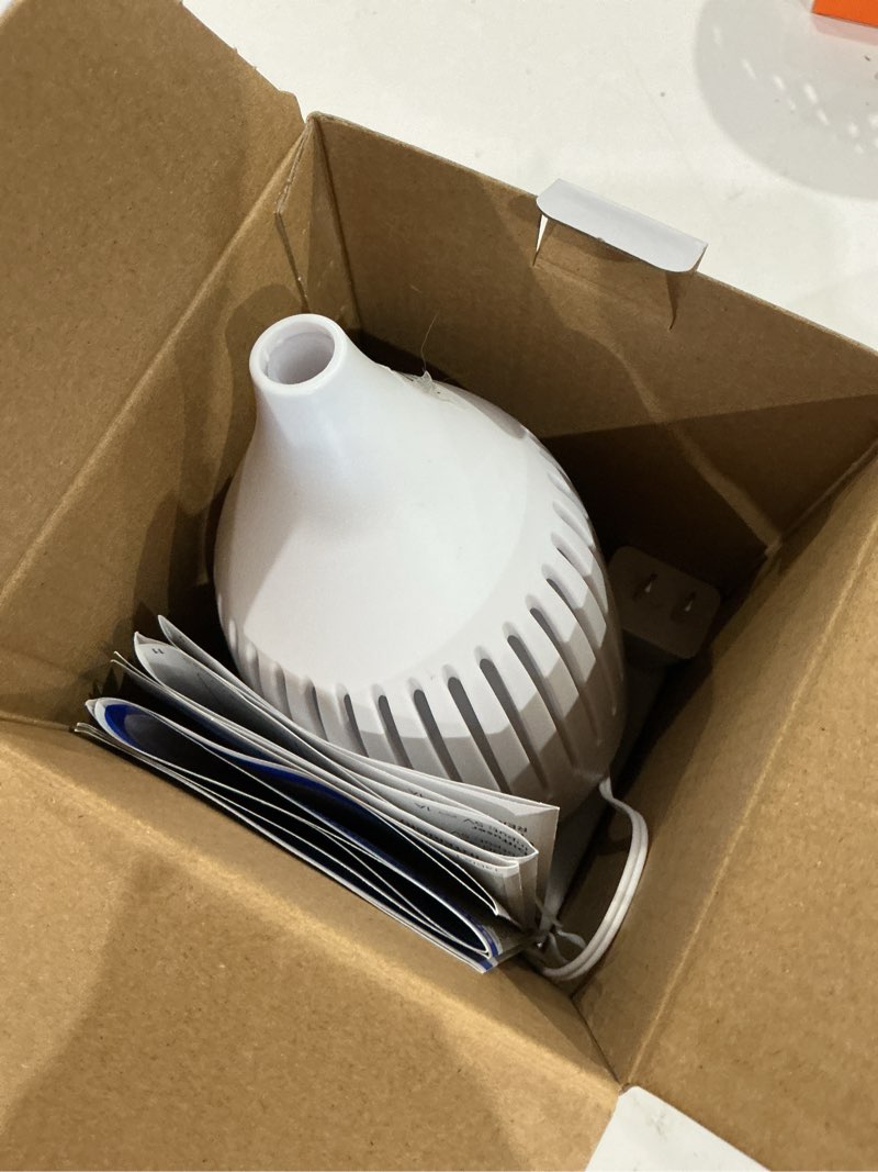 Condition photo showing As Is for mainstays white ultrasonic aroma cone 150ml oil diffuser with led glow