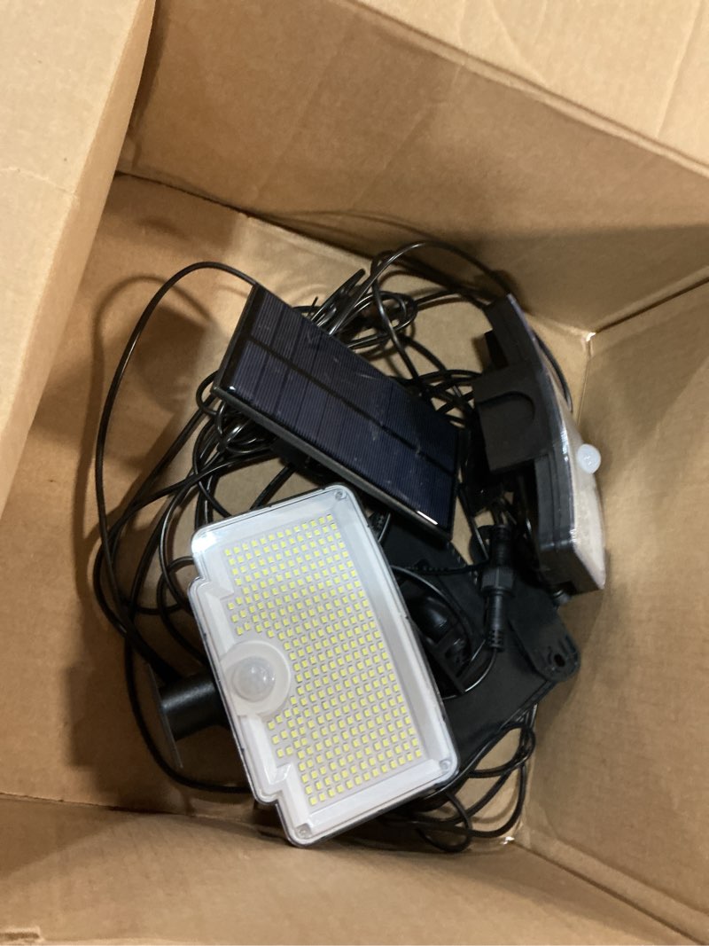 Condition photo showing As Is for intelamp 4400mAh Solar Flood Lights, 2 Pack Outdoor Solar Security Light Dusk to Dawn Auto On/Off IP65 Waterproof Solar Powered Lights for Porch, Balcony, Yard, Garage, Barn, Garden